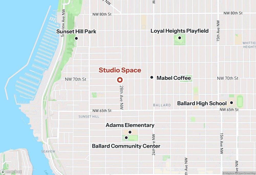 Map of the block: Studio Space at 28th Ave NW and NW 70th St, with Mabel Coffee, Sunset Hill Park, Loyal Heights Playfield, Adams Elementary, the Ballard Community Center and Ballard High School.